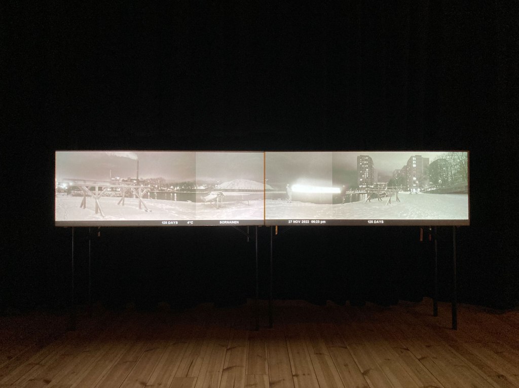 Installation view, Project proposal, Sörnäinen shoreline (2022), 2-channel video installation, video projection on folding tables, 5:30 min
