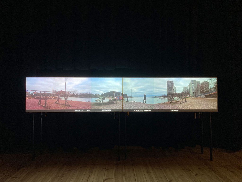 Installation view, Project proposal, Sörnäinen shoreline (2022), 2-channel video installation, video projection on folding tables, 5:30 min
